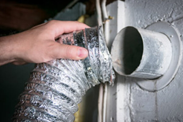 dryer vent being cleaned