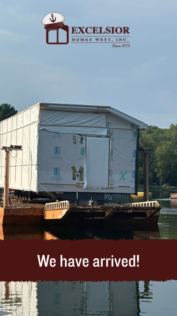Home on barge that has arrived at its destination on Big Watab Lake.